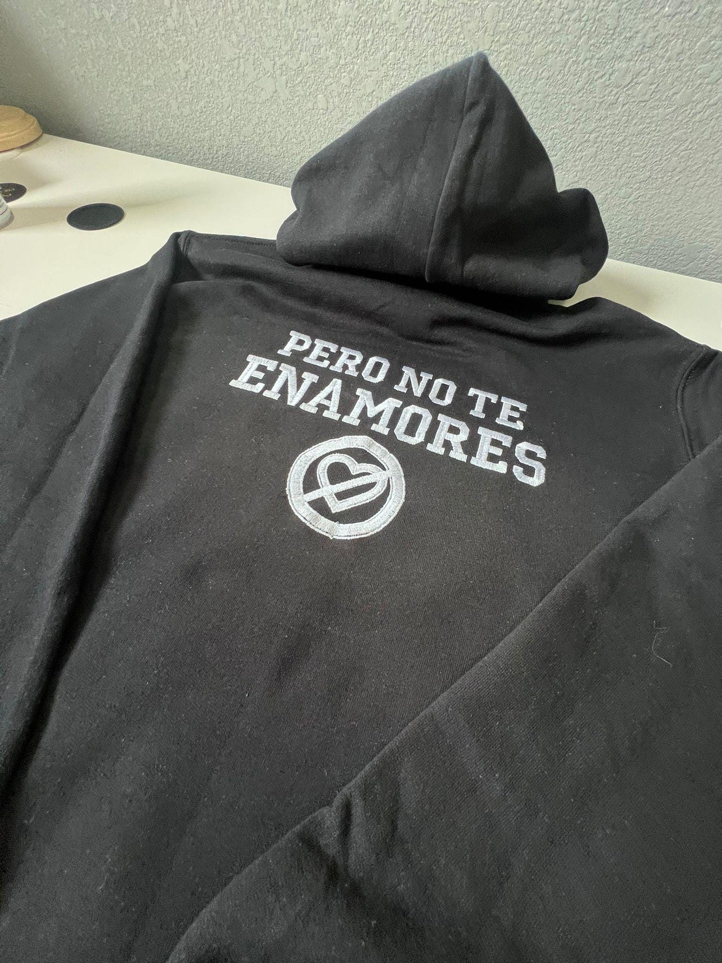 Pero No Te Enamores Embroidery Hoodie. Fuerza Regida. Front and back