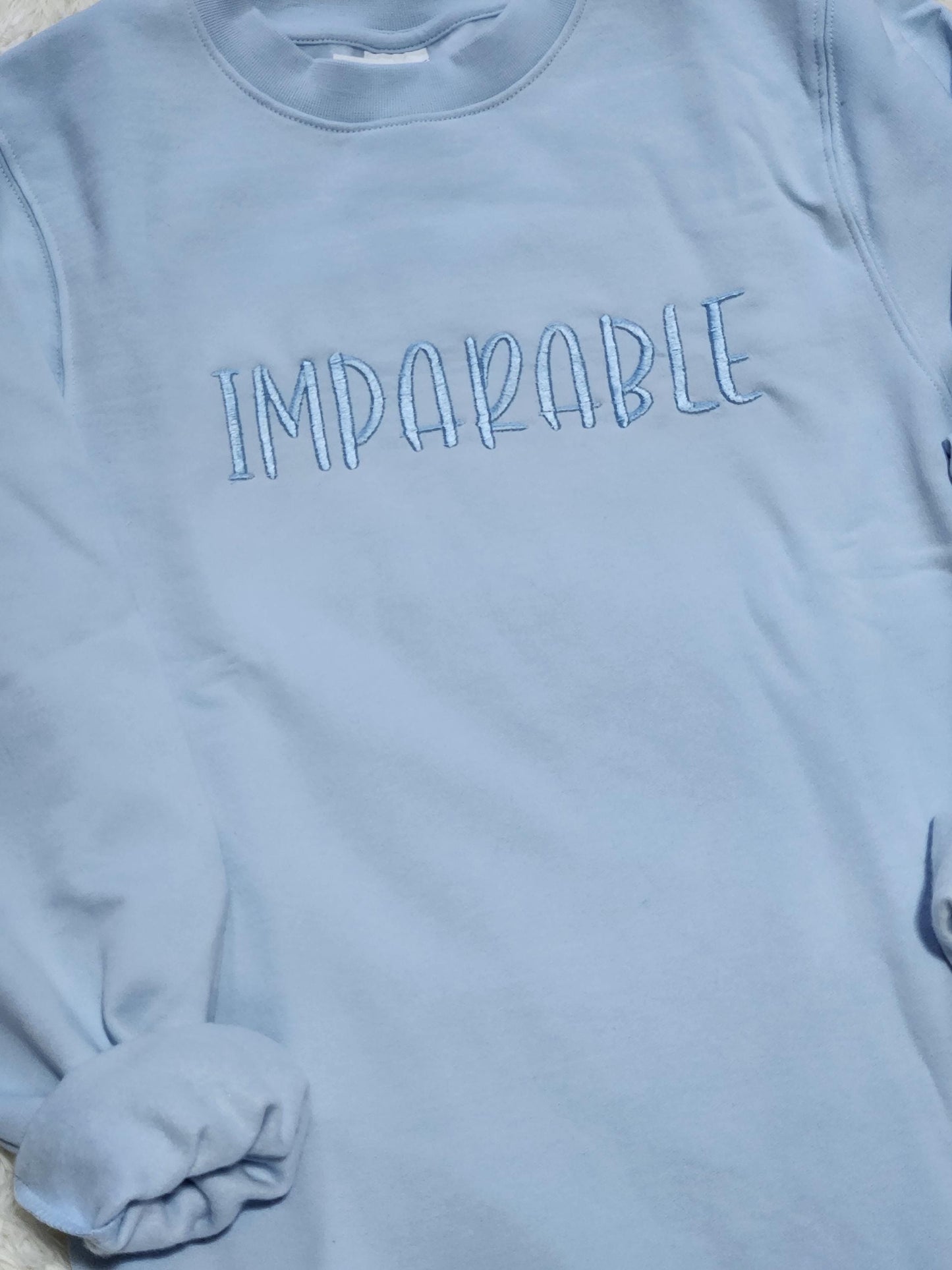 SUDADERA BORDADA IMPARABLE