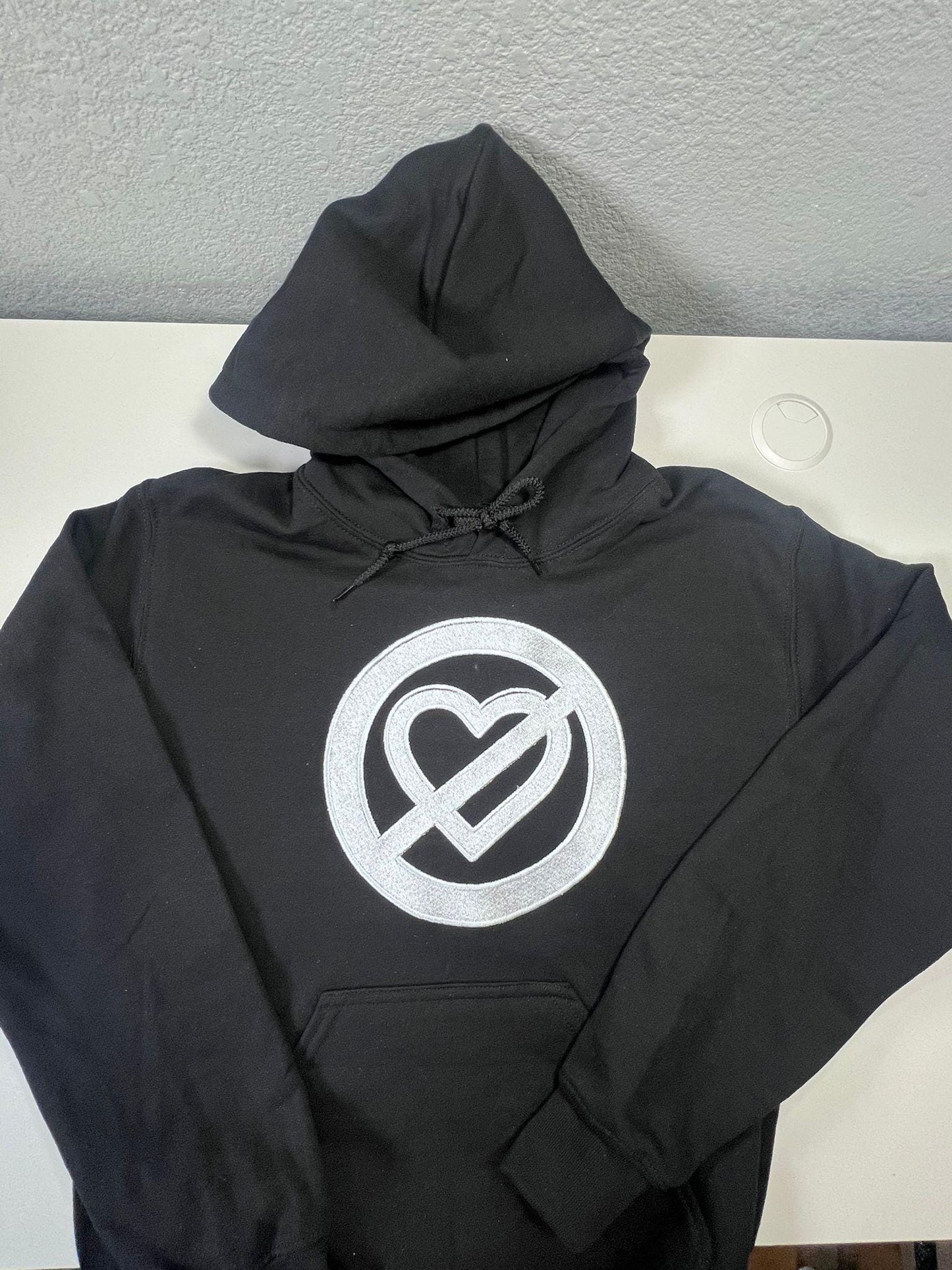 Pero No Te Enamores Embroidery Hoodie. Fuerza Regida. Front and back