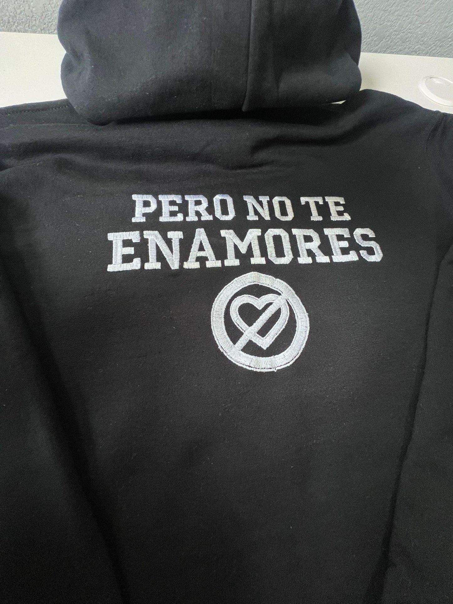 Pero No Te Enamores Embroidery Hoodie. Fuerza Regida. Front and back