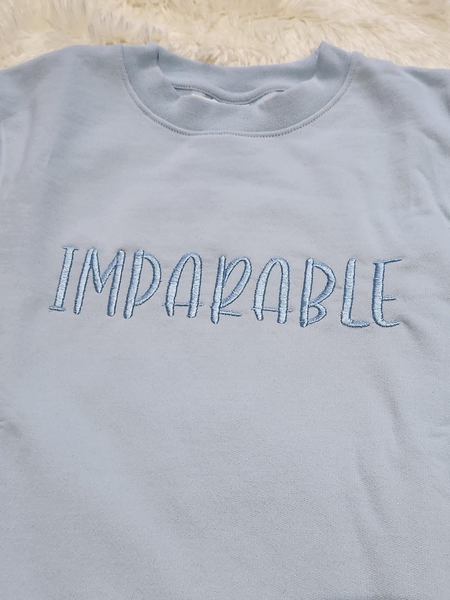 SUDADERA BORDADA IMPARABLE
