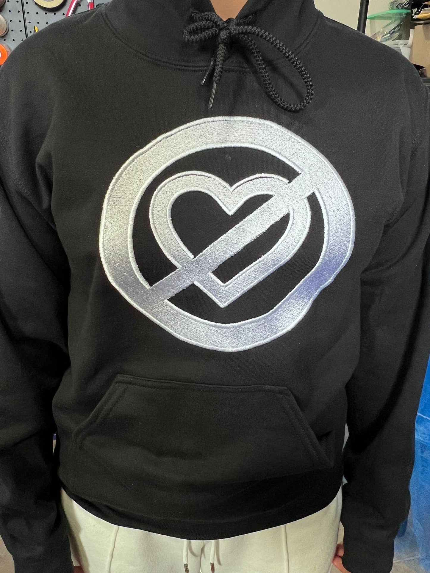Pero No Te Enamores Embroidery Hoodie. Fuerza Regida. Front and back