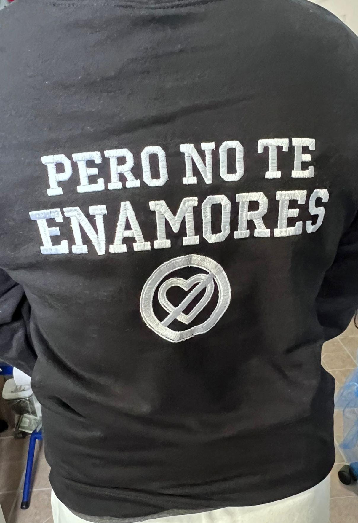 Pero No Te Enamores Embroidery Hoodie. Fuerza Regida. Front and back